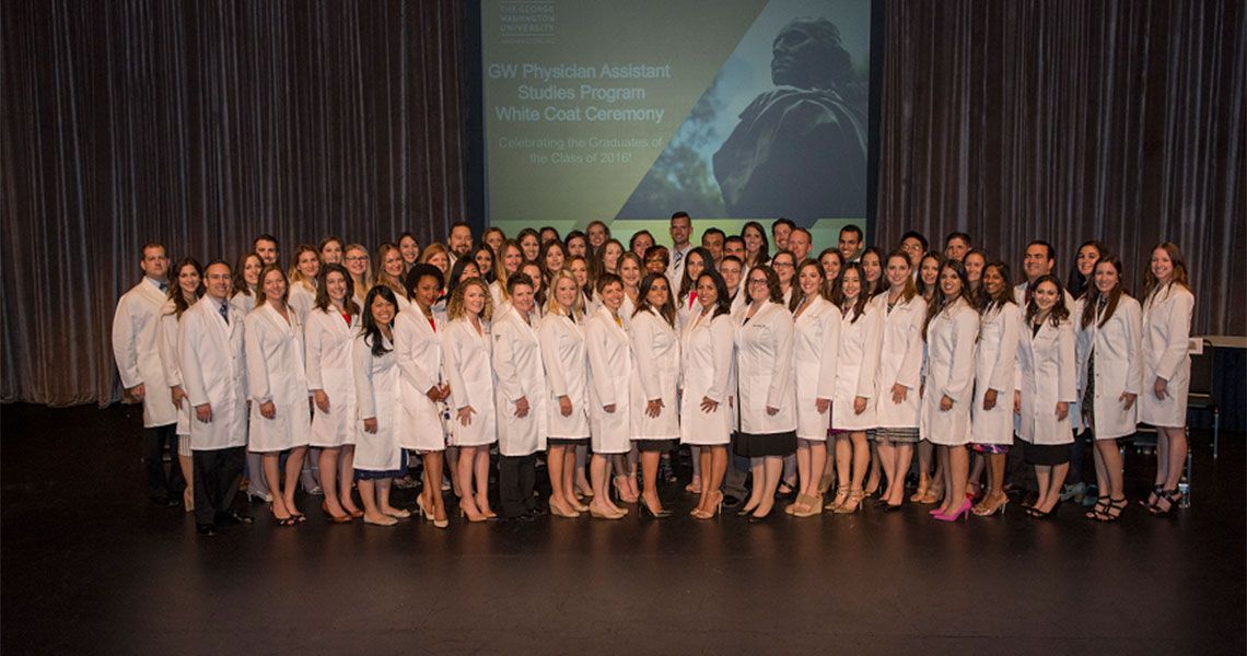 The PA Class of 2016 standing together in white coats