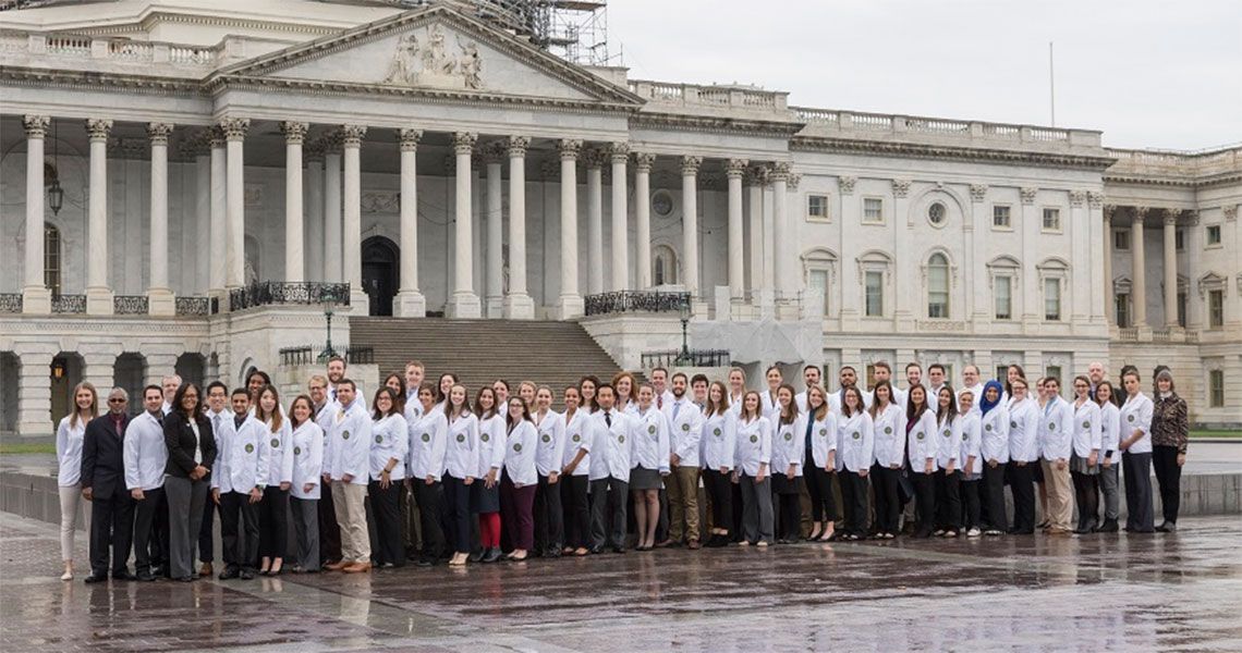 Physician assistants standing in line in front of the U.S. Capitol