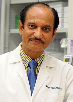 Dr. Rakesh Kumar posing for a portrait