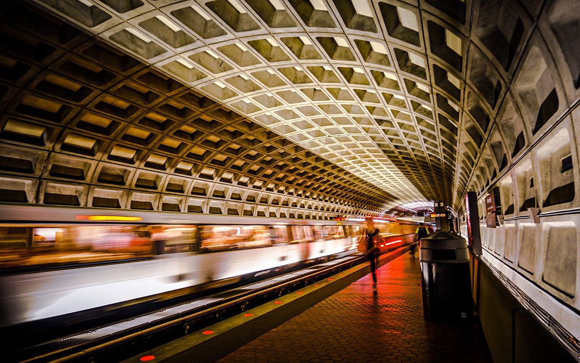 DC metro station with a train in-motion