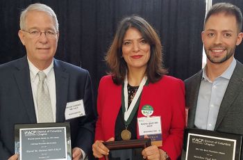 Drs. David Parenti, Nazia Qazi, and Matthew Tuck standing together holding awards