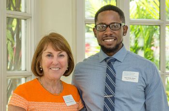 Adopt-a-Doc donor, Joanne Crantz, MD '79, and medical student Kurt Isaac-Elder smile together