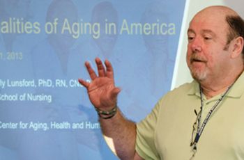 Paul Tschudi giving a presentation | "Realities of Aging in America"