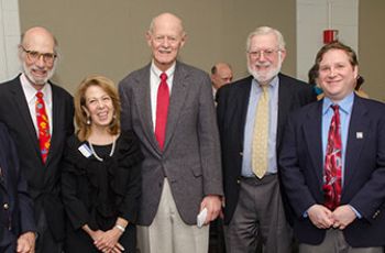 Dr. Stephen Bergman standing with colleagues