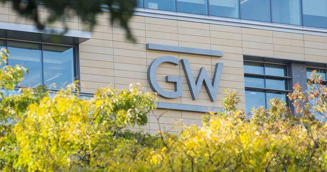 "GW" initials on the face of a building