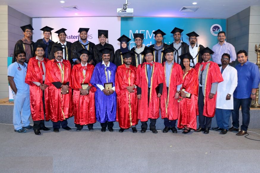 A group of graduates in graduation regalia