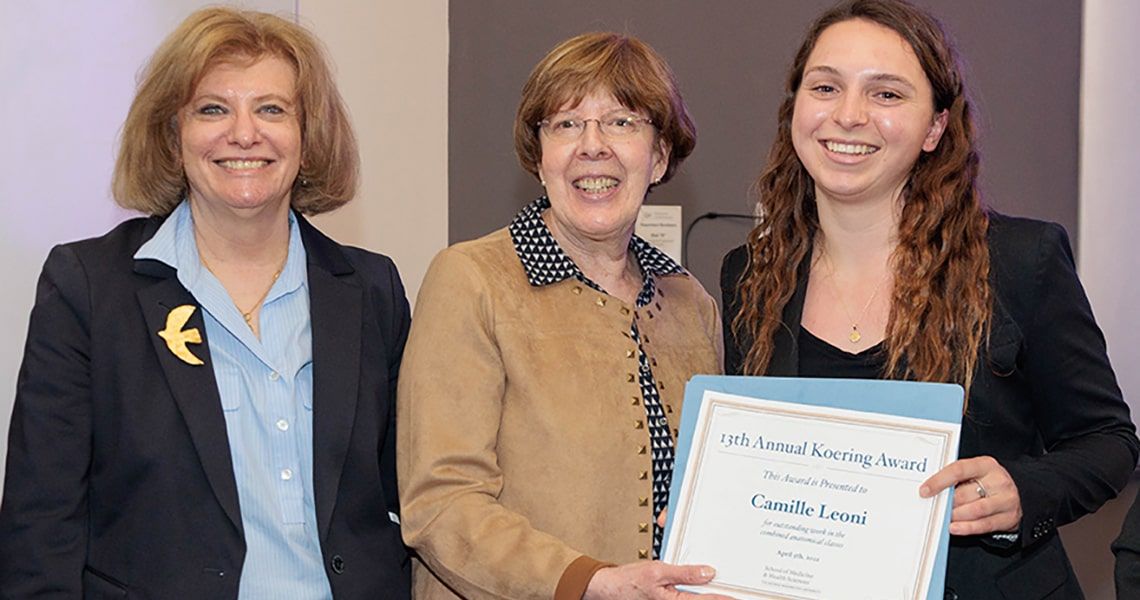 Susan Koering, Kenna Peusner, and Camille Leoni stand together