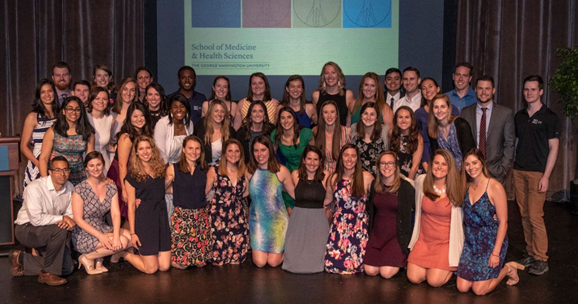 The Doctor of Physical Therapy class of 2019 standing together on a stage