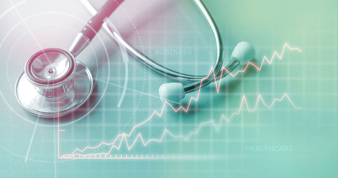 Stethoscope superimposed by a heart monitor graph