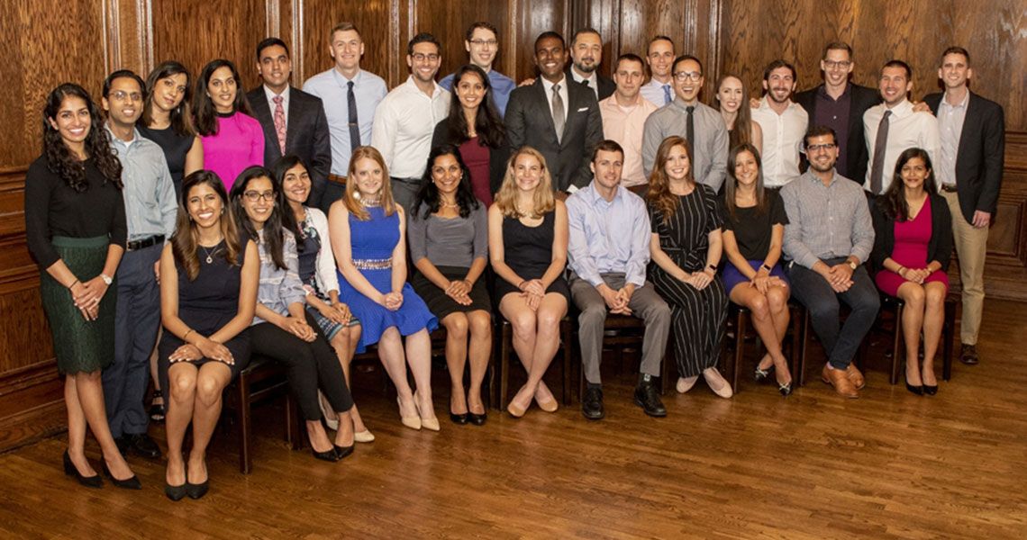 Members of the GW Alpha Omega Alpha honor society sitting together