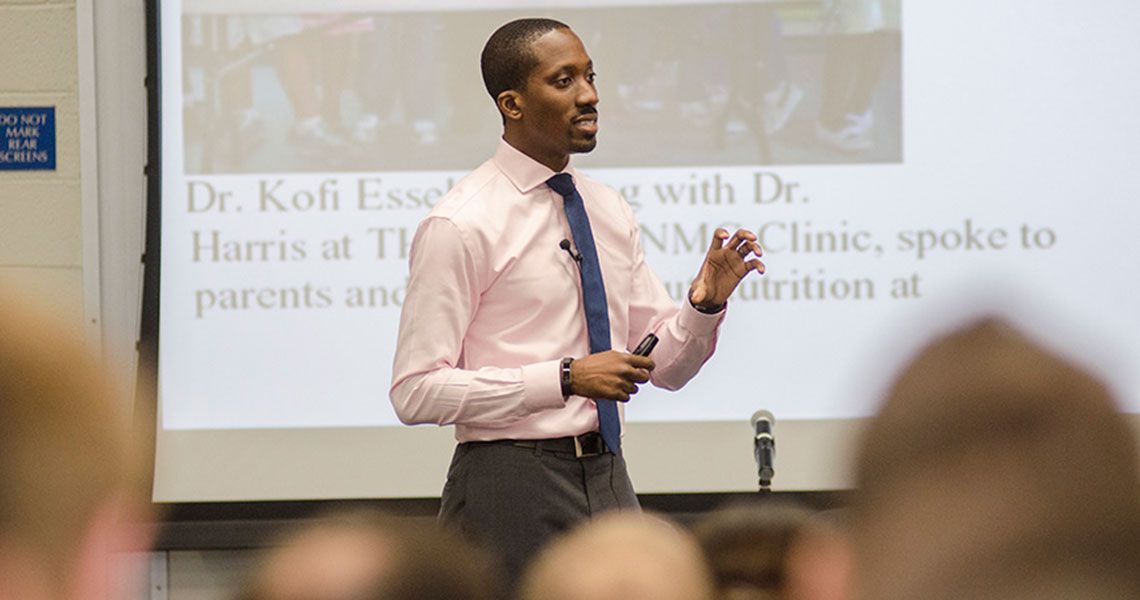 Dr. Kofi Essel giving a presentation