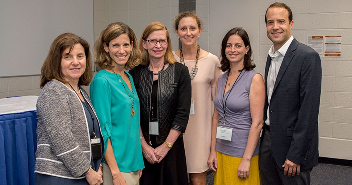From left to right: Nancy Gaba, MD; Jennifer Keller, MD, MPH; Susan Goff, MD; and Susan Teck's family members standing together.