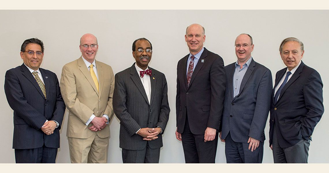 Faculty in attendance of the Cancer Symposium standing together