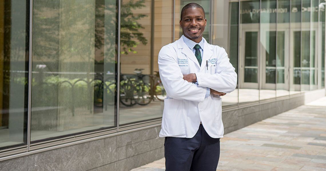 Marcus Mitchell standing outside for a portrait