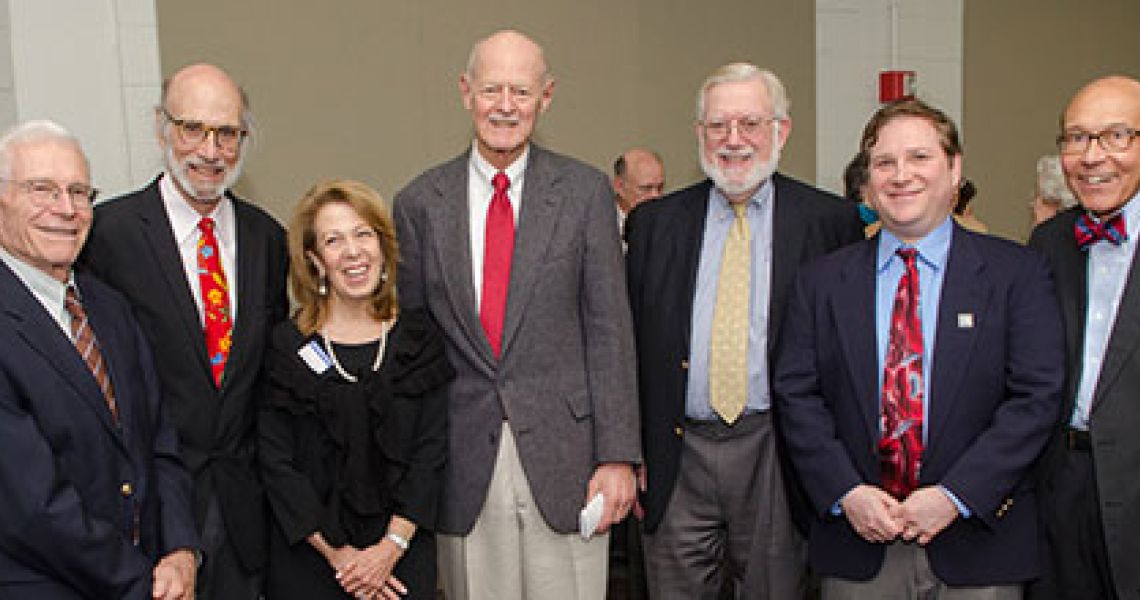 Dr. Stephen Bergman standing with colleagues