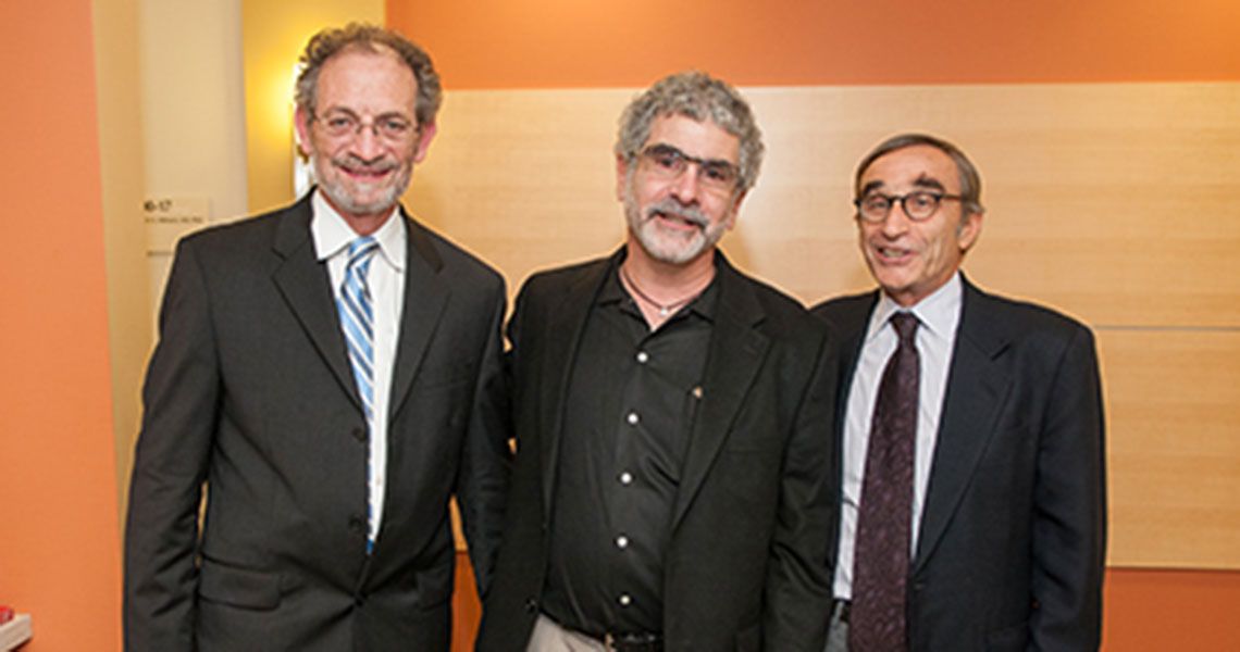 James Griffith, David Cooper and David Joseph stand together