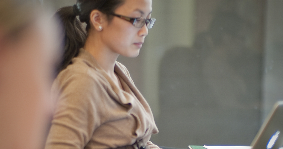 student looking at a laptop