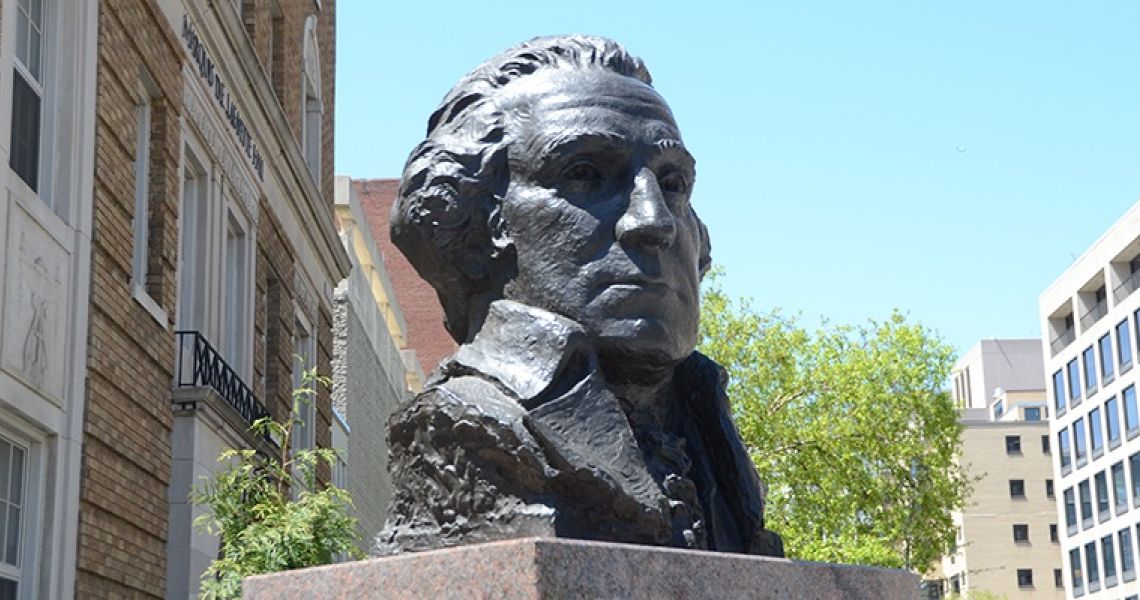 A bust of George Washington is shown on campus
