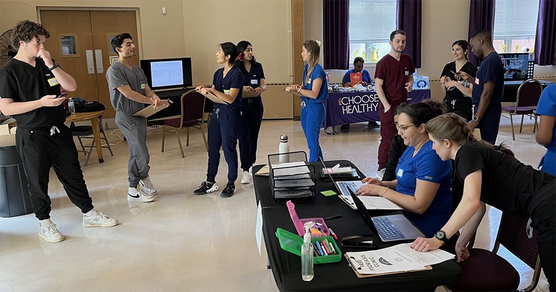 Members of the Teledermatology Clinic preparing to see patients