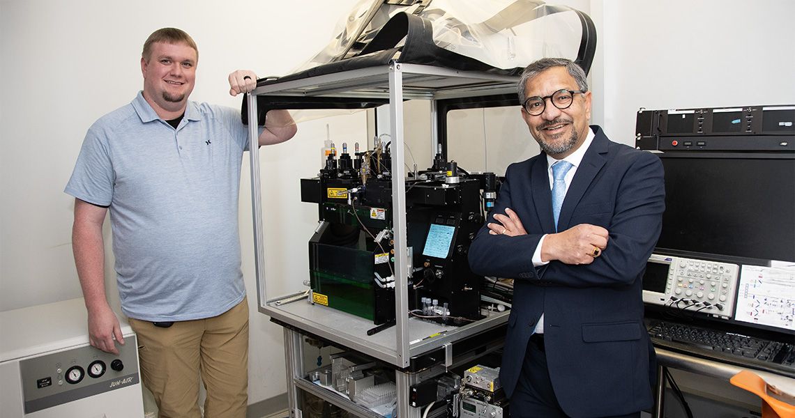 Greg Cresswell (left) with Sanjay Maggiwar (right) with the current flow cytometer
