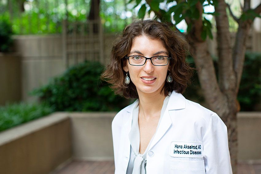 Dr. Hana Akselrod standing in a courtyard for a portrait