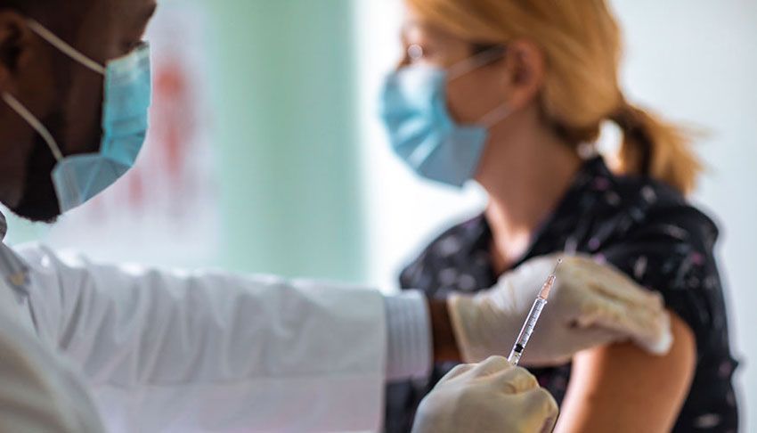 A person receives a vaccine