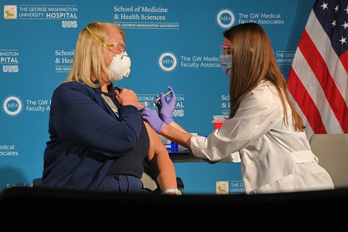 Barbara Neiswander, RN, gets vacinated