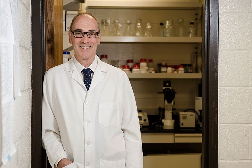 Dr. Robert Miller standing in a laboratory