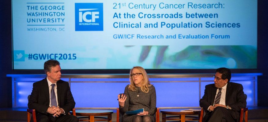 ICF International Panel members Robert Croyle, Lynn Goldman, and Eduardo Sotomayor sitting on stage