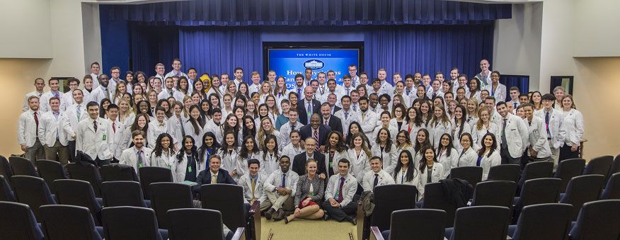 Intersession students standing together at the White House