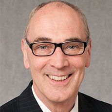 Robert H. Miller, PhD poses for a headshot
