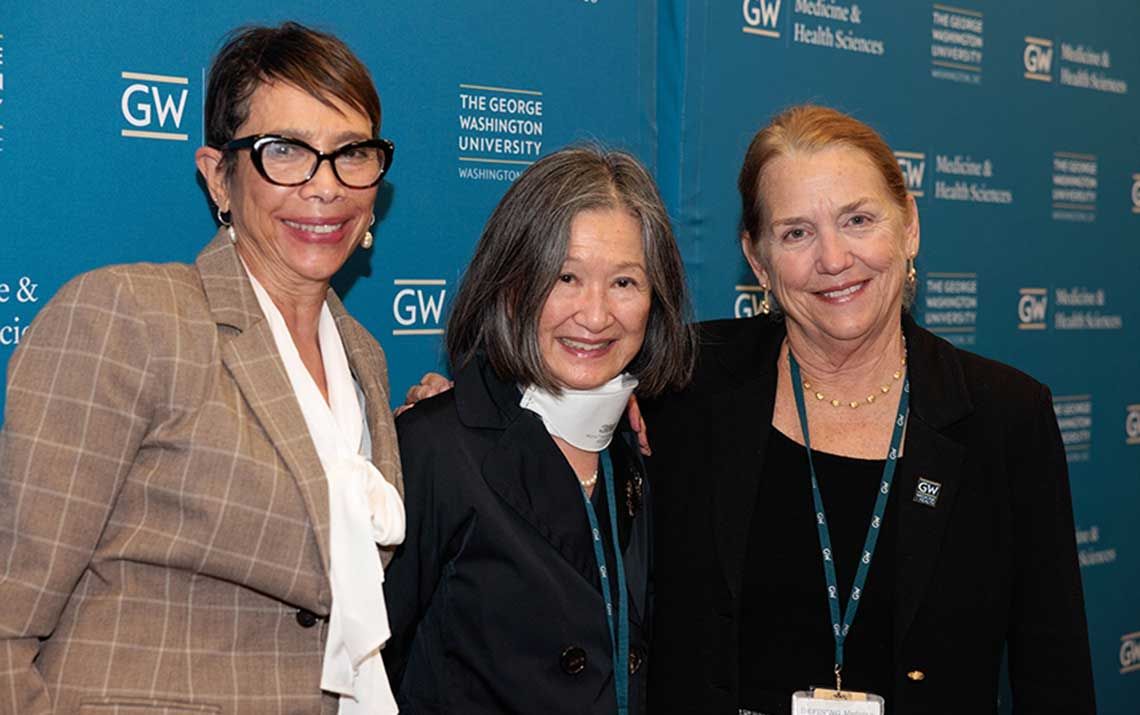 GW SMHS Professor Emerita May Chin (center) with Dean Yolanda Haywood (left) and Dean Barbara Bass (right)