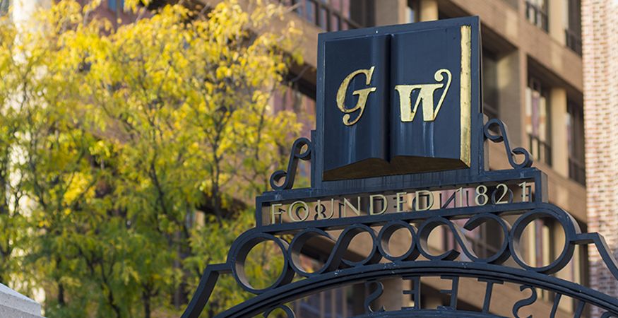 A decorative design on campus shows the "GW" initials and "Founded 1821" below