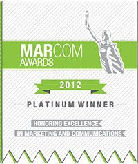 "MARCOM AWARDS 2012 Platinum Winner .. Honoring Excellence in Marketing and Communications" | Silver figure holding a torch in front of a green banner