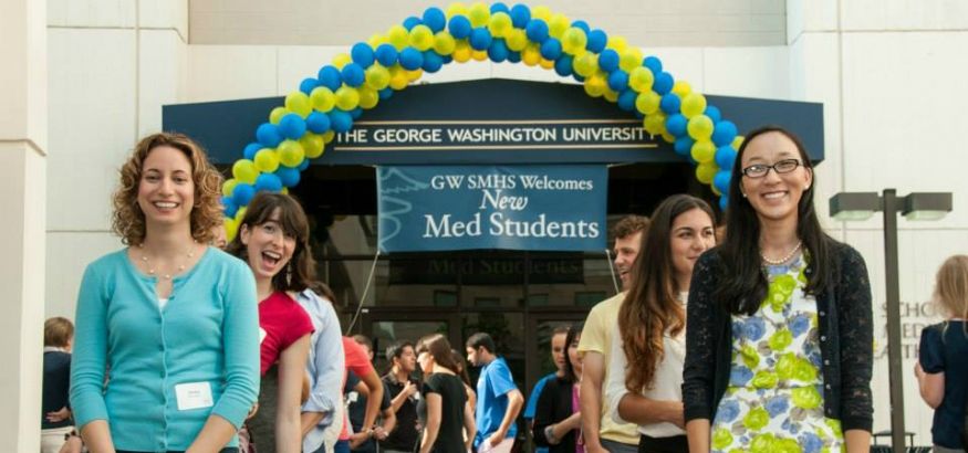 SMHS welcomes new med students event shows people lined up to greet guests