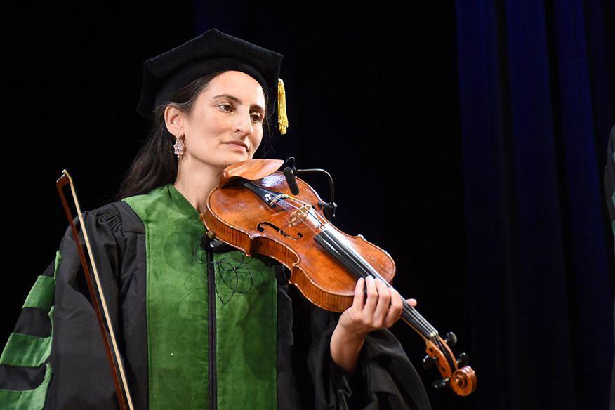 Graduate with violin
