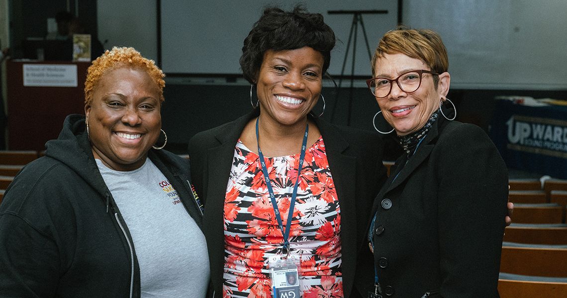 Left, College Success Foundation representative with Grace Henry, center, and Yolanda Haywood