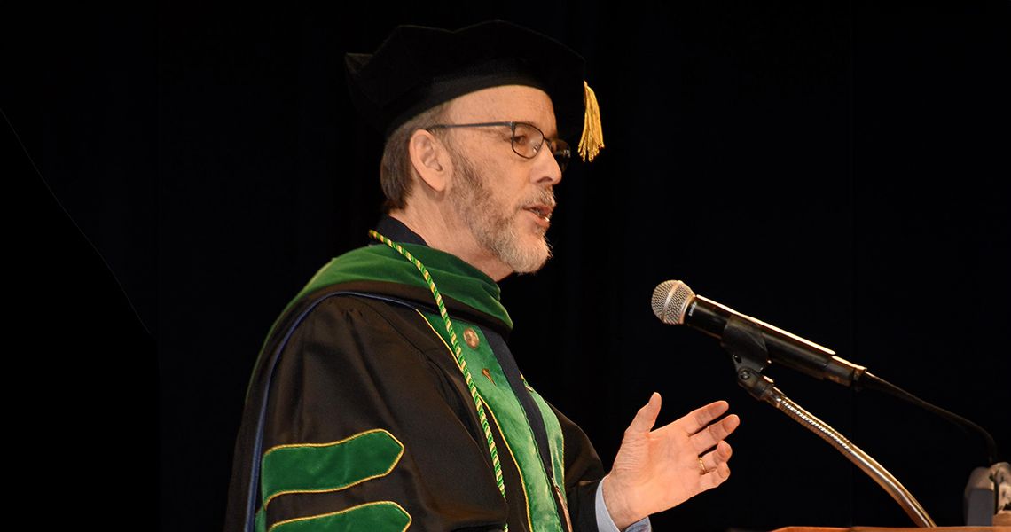 Keynote speaker Lawrence “Bopper” Deyton, MD ’85, MSPH at the podium
