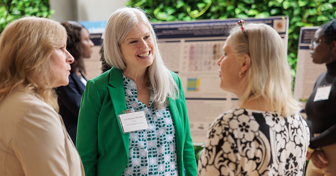 GW Cancer Center Director Julie Bauman, MD, MPH, discusses the research on display