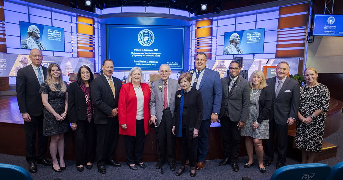 Carrera and Perlin families with Akman, GW President Grandberg, Provost Bracey, and Dean Bass