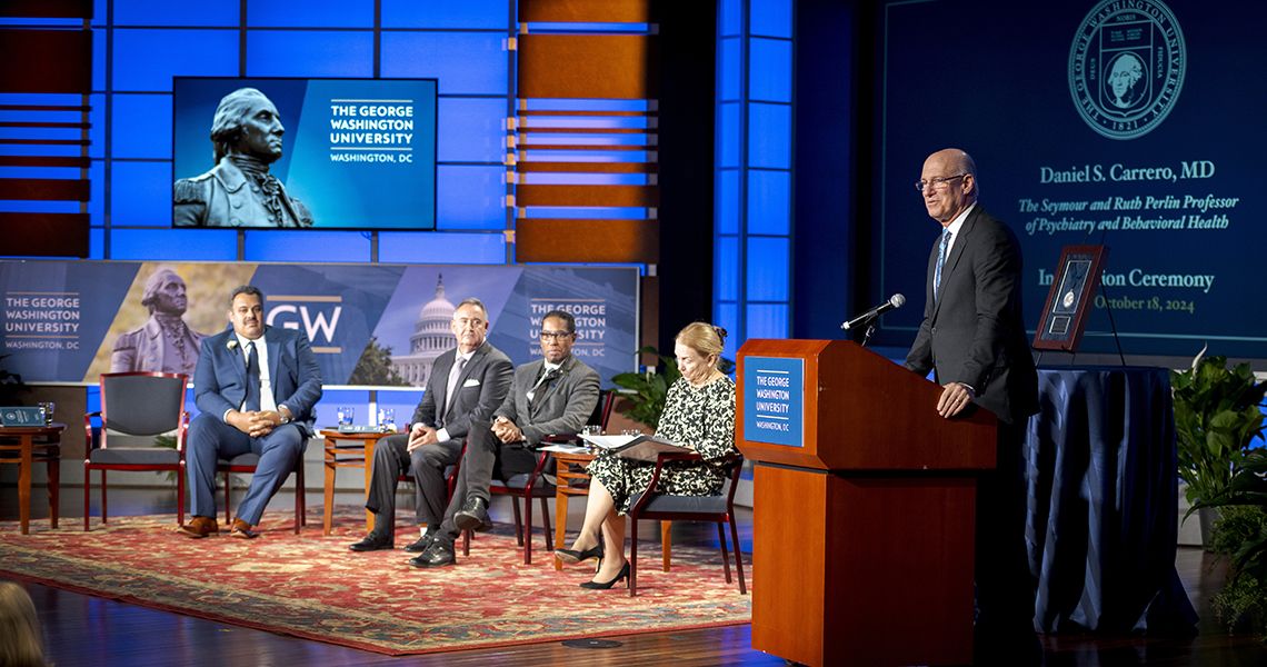 Jeff Akman, MD, speaks at podium
