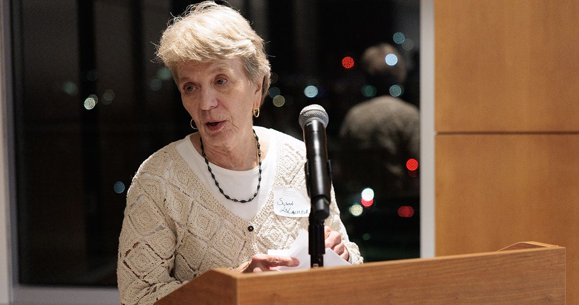 Susan LeLacheur, DrPH, PA-C, speaking at podium