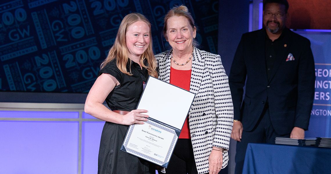 Staff Excellence awardee with Dean Bass