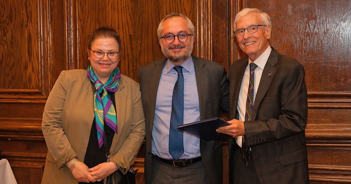 Center, Amir A. Afkhami MD ’03, PhD, with Lapps (left) and Wasserman (right)