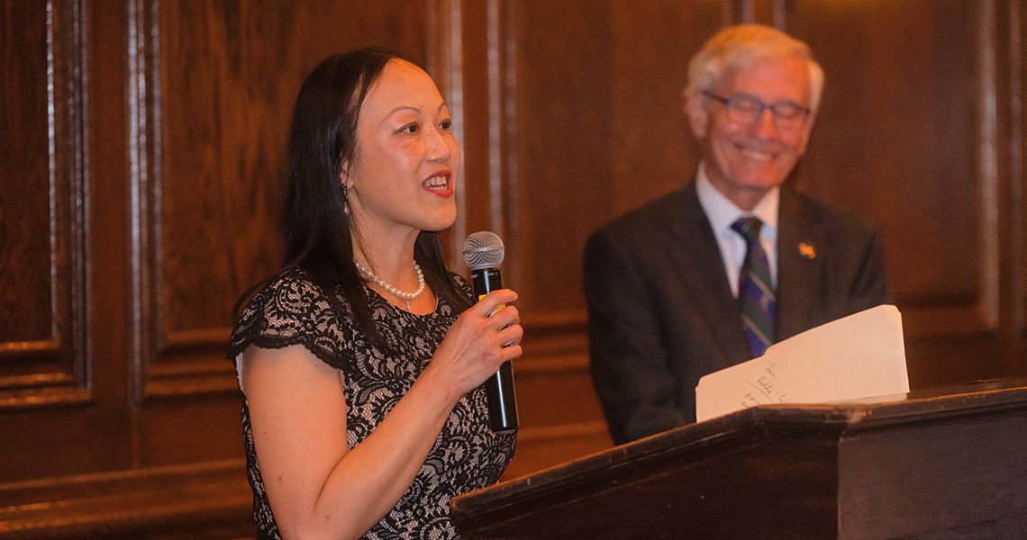 Juliet Lee, MD, RESD ’02, speaks at podium