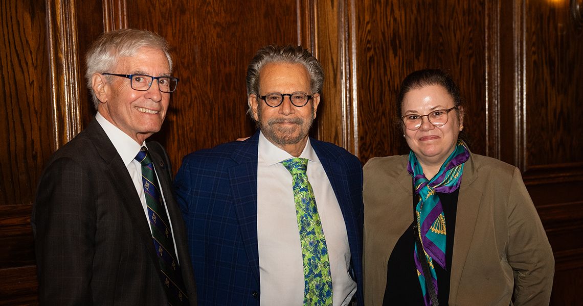 Center Paul Rhodes, MD, with Wasserman (left) and Liappis (right)