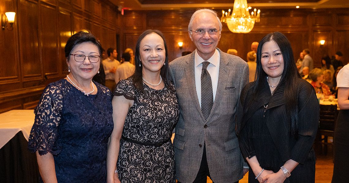 Juliet Lee, MD, and Anton Siddawy, MD and Lee family members