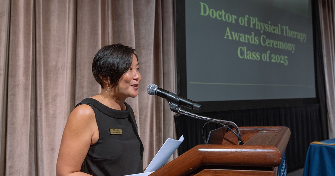 Marisa Birkmeier at the podium