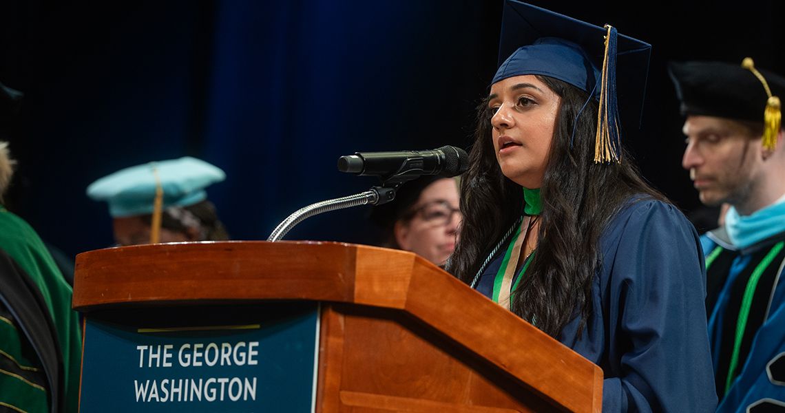 Student speaker at the podium during Health Sciences celebration