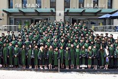 MD Graduate Students standing on the steps of Gelman Library
